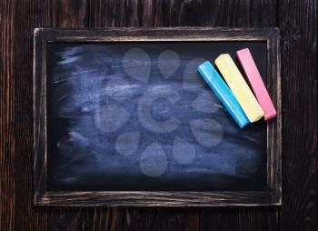 black board and chalk on a table