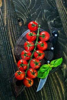 fresh tomato, cherry tomato on a table