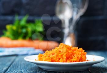 carrot on plate and on a table