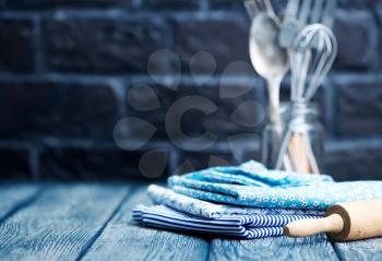  kitchenware on the wooden table, napkin and kitchenware