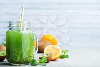smoothie with fresh fruits, drink from kiwi and lemon