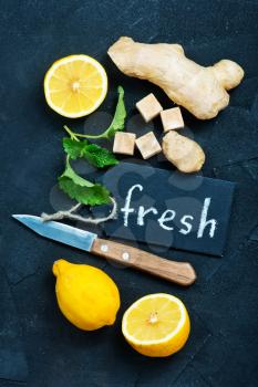 ginger with lemon and mint on a table