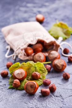 hazelnuts in bag and on a table
