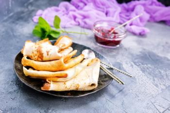 pancakes with berries on plate, stock photo
