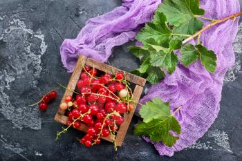red currant in wooden box,stock photo