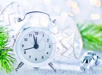 Christmas background, Christmas decoration and clock on a table