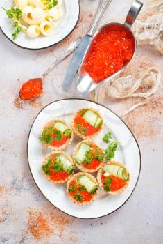 tartalets with butter and caviar, stock photo