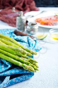 green asparagus on kitchen table, fresh asparagus