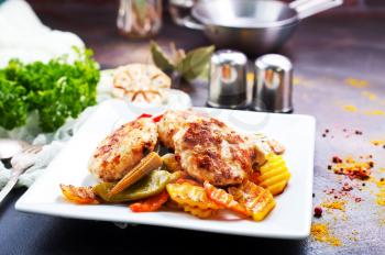 baked chicken vegetables with cutlets, stock photo