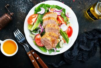 baked chicken with salad, chicken and vegetables, diet food, stock photo