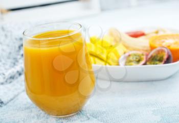 mango juice in glass, fresh juice and fruits