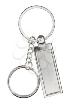 Hanging silver key chain with scratches with chain and rings isolated on white background