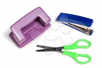 Office stationery, stapler, puncher and scissors isolated on white