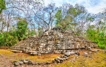 Ruins of a Mayan pyramid at the Balamku Site in Campeche, Mexico