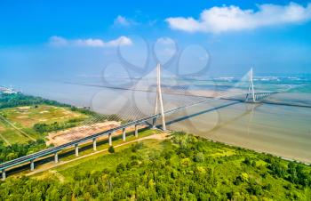Aerial view of the Pont de Normandie, a cable-stayed road bridge that spans the river Seine linking Le Havre to Honfleur in Normandy, northern France