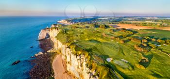 Aerial panorama of seaside with chalk cliffs at Etretat - Normandy, France