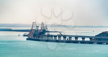 View of the Crimean Bridge with the road part finished and the railway part under construction. The Kerch Strait, Europe