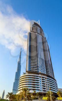 DUBAI, UAE - JANUARY 1: View of the Address Downtown Hotel on fire in Dubai on January 1, 2016. The tower burned down on the New Year's night