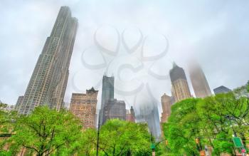 Skyscrapers of Manhattan in the fog - New York City, United States