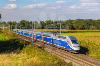 STRASBOURG, FRANCE - SEPTEMBER 22: SNCF TGV Euroduplex train on a way from Strasbourg to Paris on September 22, 2013 in Strasbourg, France. The second phase of high-speed railway between Strasbourg and Paris LGV Est will be opened in 2016