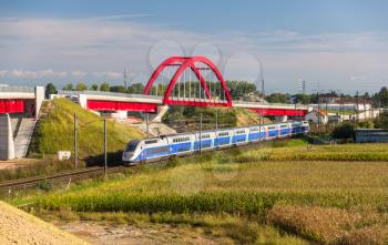 STRASBOURG, FRANCE - SEPTEMBER 22: SNCF TGV Euroduplex train on a way to Paris on September 22, 2013 in Strasbourg, France. Complete hi-speed railway between Strasbourg and Paris to be opened in 2016