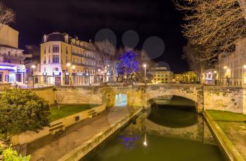 Night view of Canal de la Robine in Narbonne, France
