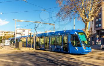 MONTPELLIER, FRANCE - JANUARY 05: Alstom Citadis 401 tram on January 5, 2014 in Montpellier, France. The Montpellier tramway system has 4 lines and 84 stations