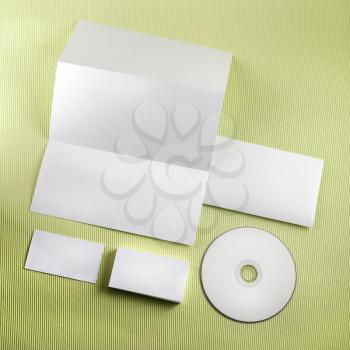 Corporate identity on green background. Blank stationery. Top view.