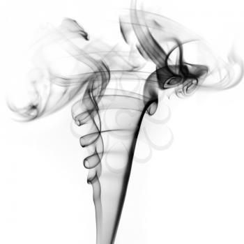 Photo of abstract smoke swirl on white background. Studio shot.