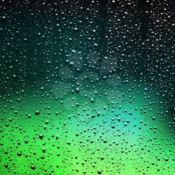 Droplets of water on the glass. Water drops background.