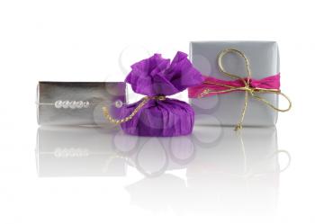 Decorated gift boxes on a white background. Front view. Shallow depth of field. Isolated with clipping path.