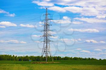 Electricity transmission pylon. High voltage pylon against blue sky background.