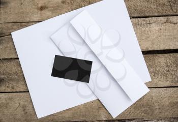 Blank stationery and corporate identity template on wooden background. For design presentations and portfolios.