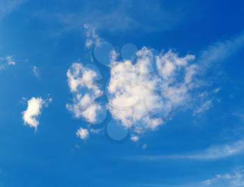 White cloud in the blue sky background. Sunny summer day.