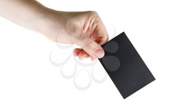 Black business card in hand. Isolated on white. Clipping path.