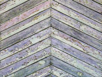 Old grunge wooden planks background with peeling paint.