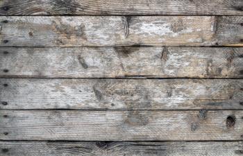 Wooden planks texture. Rustic weathered wood background with knots.