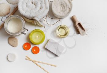 Spa still life. Wellness cosmetic products on white paper background.