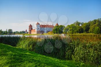 Mir, Belarus - August 11, 2017: Castle on the shore of the lake. Castle in Mir, Belarus - historical heritage of Belarus.