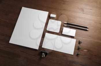 Blank stationery mock-up. Template for branding identity on wood table background.