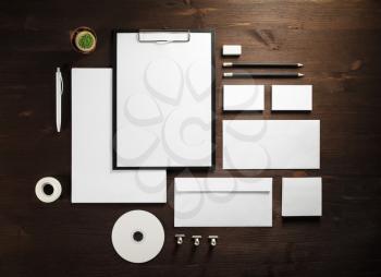 Branding mock up. Photo of blank corporate stationery on wooden background. Flat lay.