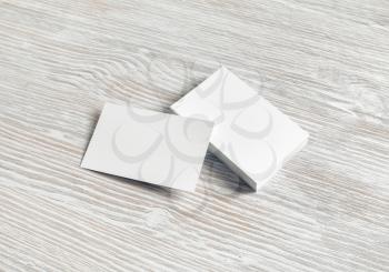 Mockup of blank business cards on light wooden background. Branding mock up.