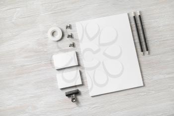 Blank white stationery set. Business brand template on light wooden background. Flat lay.