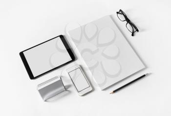 Photo of blank stationery set on paper background. Corporate identity template. Responsive design mockup.