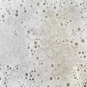 Foam with bubbles. abstract white background. Detergent in water.