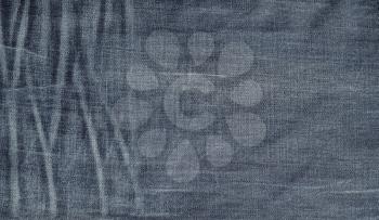 Old jeans texture. Vintage denim as background.