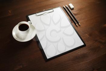 Blank corporate stationery set on wood table background. ID mockup. Responsive design template.