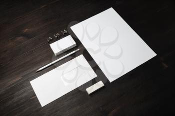 Blank stationery set on wood table background. Corporate identity template. Responsive design mockup.