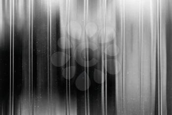 Vertical black and white vintage dirty metal film scan backdrop