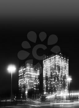 Vertical black and white motion blur skyscraper abstract backdrop